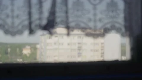 A view from the vindow with a waving curtain, changing focus Stock-Footage 237454806
