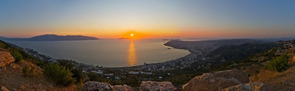View on Vlora at sunset in a panorama composition Stock Photos