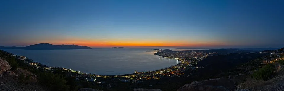 View on Vlora at sunset in a panorama composition Stock Photos