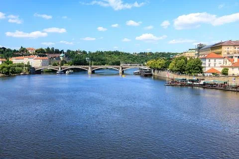View of the Vltava River with a bridge and river boats from the Charles Bri.. Stock Photos