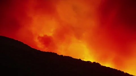 View of volcanic eruption with glowing lava in Spain. Видео 340637898