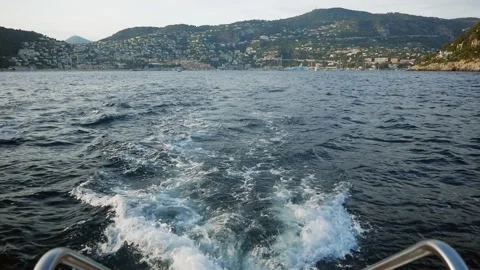 View of wake back of yacht. Ship leaving Nice port Stock Footage 130418119