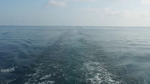 View of the wake behind a modern ship ship at sea Stock Footage 116442932