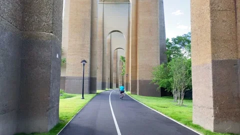 View of the Walking Trail Under the Hell Gate Bridge Video stock 139220647