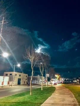 View of a walkway at night Stock Photos