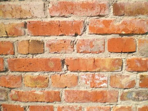 View of the wall of an old crumbling brick Stock Photos