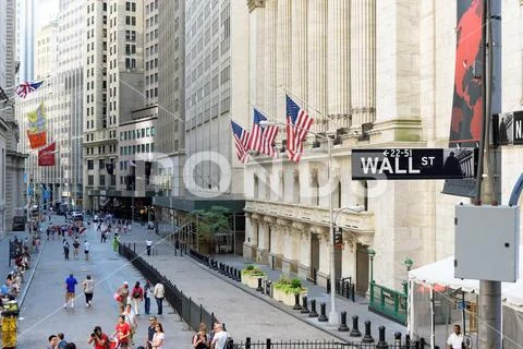 A view of Wall Street and New York Stock Exchange Stock Photos