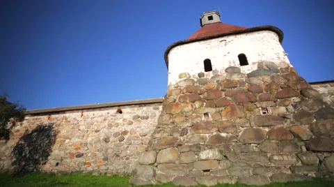 View of walls of Russian Orthodox Solovetsky Monastery made of huge stones. Stock Footage 64929579