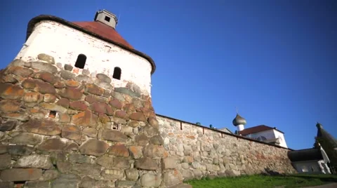 View of walls of Russian Orthodox Solovetsky Monastery made of huge stones. Stock Footage 64929592