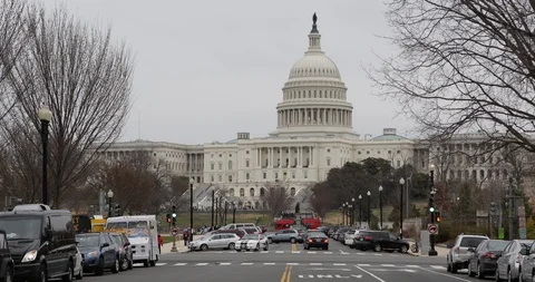 View of Washington DC Us Capitol Congress Building People Cars Traffic Jam Day Stock Footage 95297416