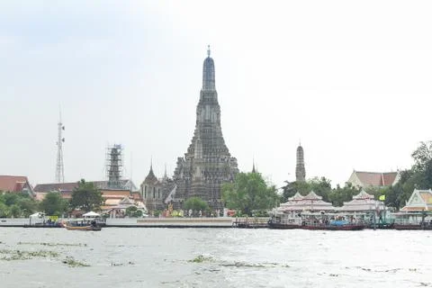 View of Wat Arun temple from the river, Bangkok, Thailand. Stock Photos