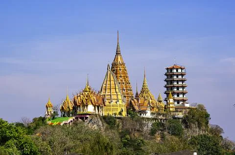 View of Wat Tham Sua, the beautiful buddhist temple on top of the mountain. Stock Photos