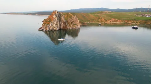 View from the water to Cape Burkhan or Shamanka Rock. Stock Footage 237702174
