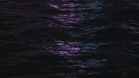 View of the water with city lights reflections in Hong Kong Stock Footage 85308341