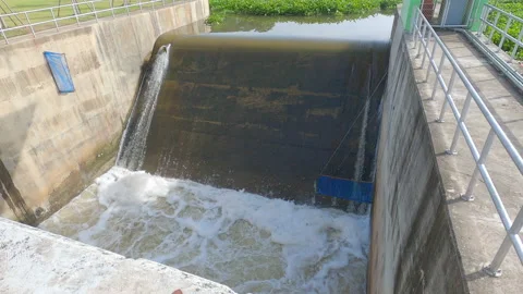The view of water flowing through low dam with strong current. Stock Footage 162526566
