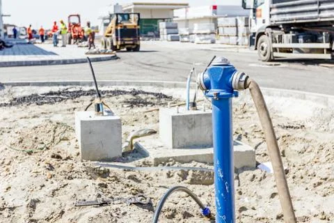 View on water hose on the construction site. Stock Photos