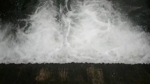 View of water rushing through the gates at a dam. Stock Footage 149933561