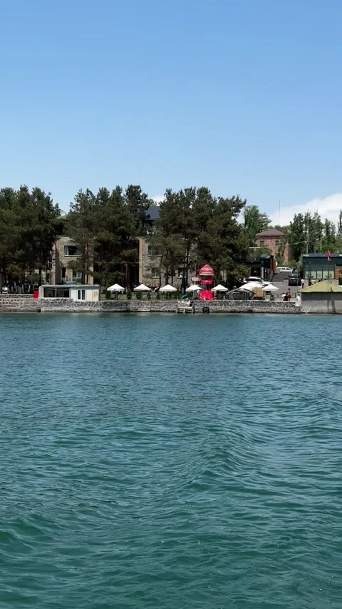 View from the water to the sky city. Sevan. Armenia. 15/06/2025 Stock Footage 312383928
