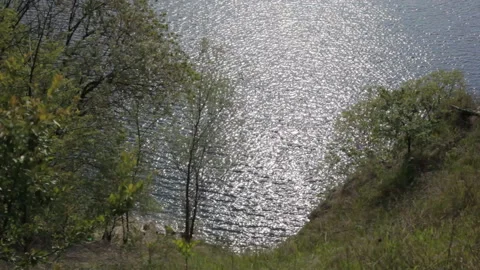 View of the water surface of a mountain lake in sunny weather. Background. Stock-Footage 112633621