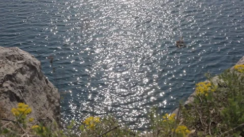 View of the water surface of a mountain lake in sunny weather. Background. Stock-Footage 112633780