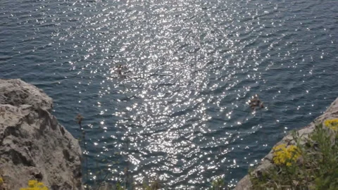 View of the water surface of a mountain lake in sunny weather. Background. Stock Footage 112633799