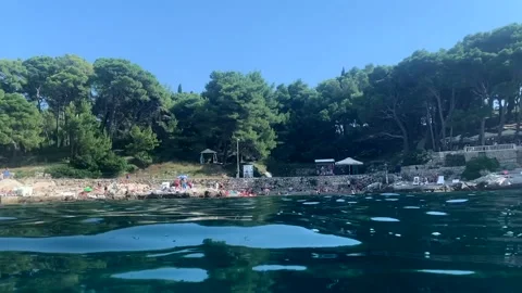 View from the water towards Rat Beach Croatia Stock Footage 137452100