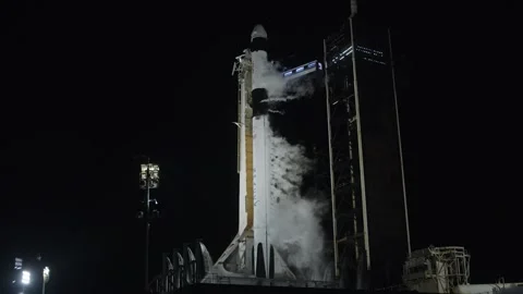 View from water tower of SpaceX Dragon Crew-8 mission spacecraft launch Stock Footage 289728844