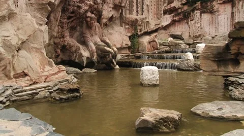 View to the waterfall and monument in the Datang Furong Garden in Xian, China. Stock Footage 66798950
