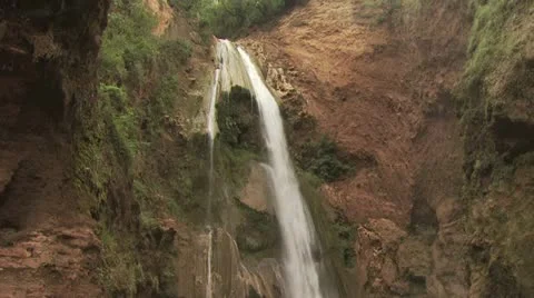 View of A Waterfall and Rugged Mountain Landscape Stock-Footage 19227746