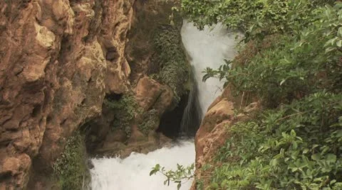 View of A Waterfall and Rugged Mountain Landscape 2 Video stock 19227850