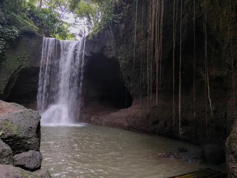 A view of a waterfall in Bali. Called "Suwat Waterfall" Foto stock