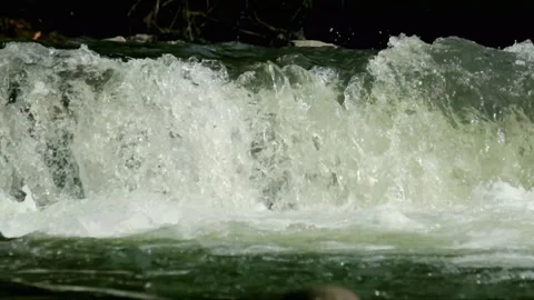 View of a waterfall in a clear and fast-flowing mountain river 1 Stock Footage 320923198