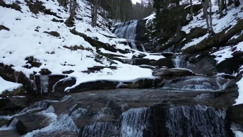 View of a waterfall during winter. Cold and frost in the forest Stock Footage 264273522