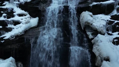 View of a waterfall during winter. Cold and frost in the forest Stock Footage 264274917