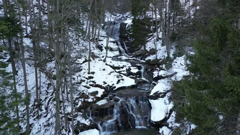View of a waterfall during winter. Cold and frost in the forest Stock Footage 267694086