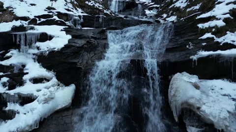 View of a waterfall during winter. Cold and frost in the forest Stock Footage 271360455