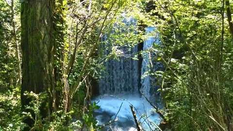 View of a waterfall of the Llobregat River in a rainy summer Video stock 124857185