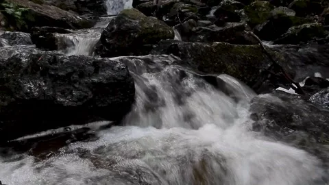 View of a waterfall in a mountain river Stock Footage 252002496