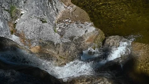 View of a waterfall from a mountain stream (slow motion) Stock-Footage 219645929