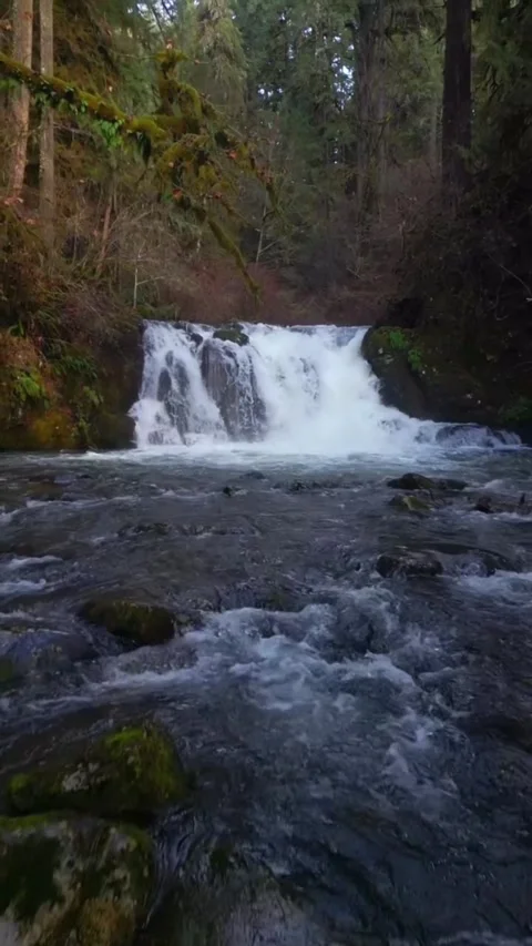 View of waterfall in the mountains Stock Footage 274276408
