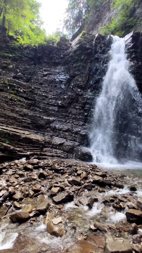 View of waterfall in mountains forest Stock Footage 160887539