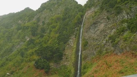 View of waterfall on north west part of Madeira Stock Footage 90102604