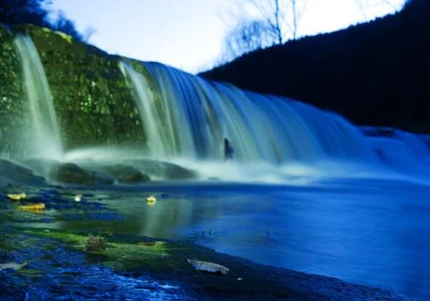 View on waterfall while playing with flashlight Foto stock