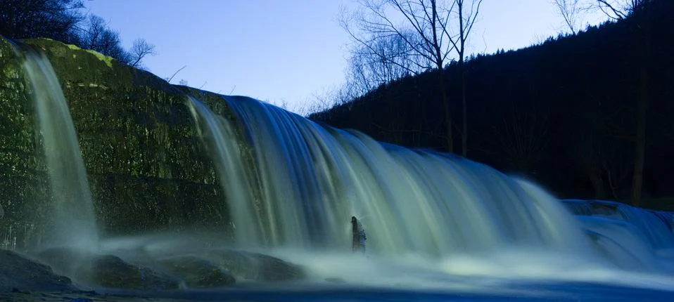 View on waterfall while playing with flashlight Stock Photos