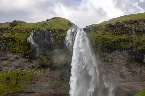 View of waterfall on a windy day Stock Photos