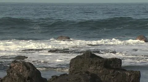 View of A Wave As It Hits the Rocky Shore Video stock 19197984