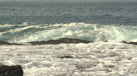 View of A Wave As It Hits the Rocky Shore 5 Video stock 19198683