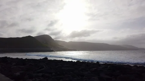 View of the Waves and Beach and Sun Glare in Frame Video stock 116111213