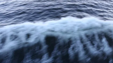 View of waves and distant coastline from side of ferry on Puget Sound. Stock Footage 86757893