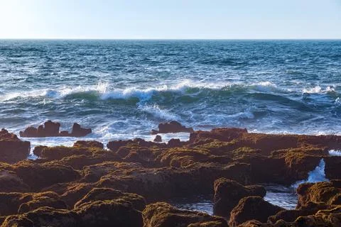 View of the waves of the Atlantic Ocean in the area of the city of Essaouir.. Stock Photos